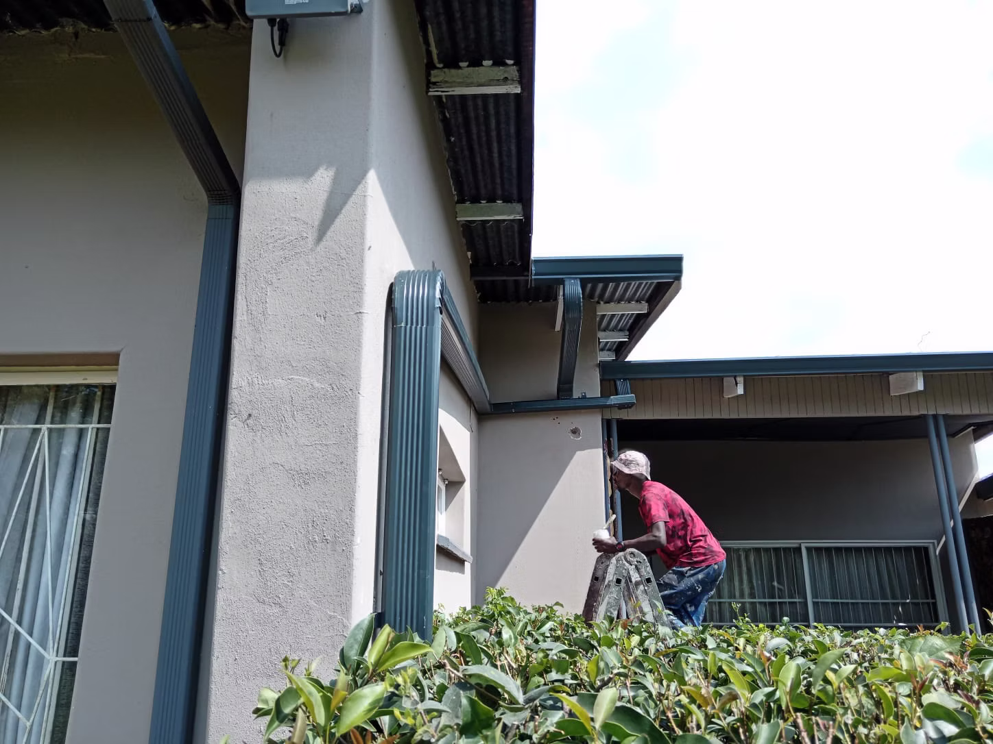 Professional aluminium gutter installation on residential roof in Centurion Gauteng