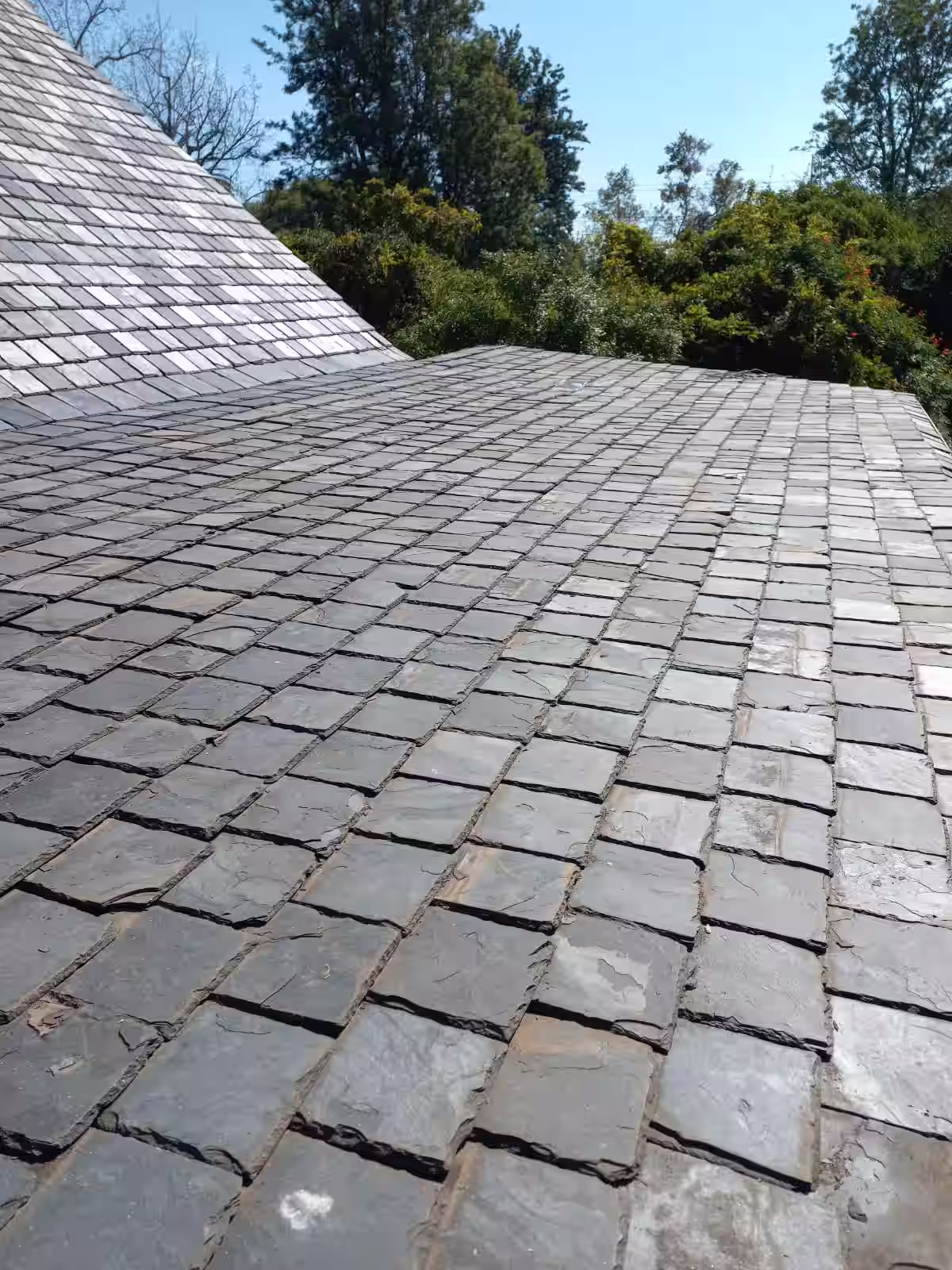 Completed tile roof repair showing restored ridge capping and new tiles — Centurion Gauteng