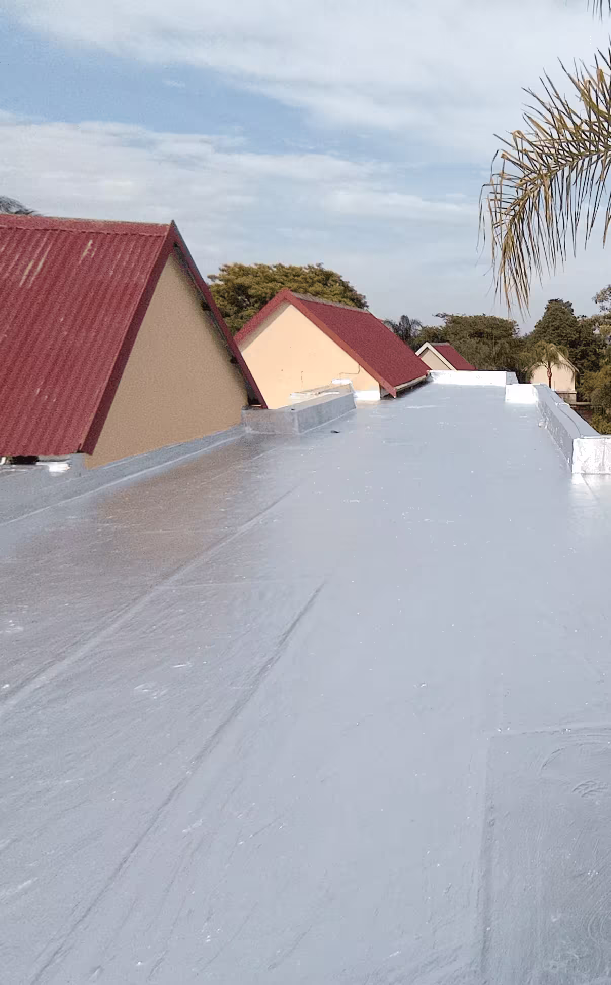 Flat roof after torch-on waterproofing membrane installation — fully sealed, Centurion