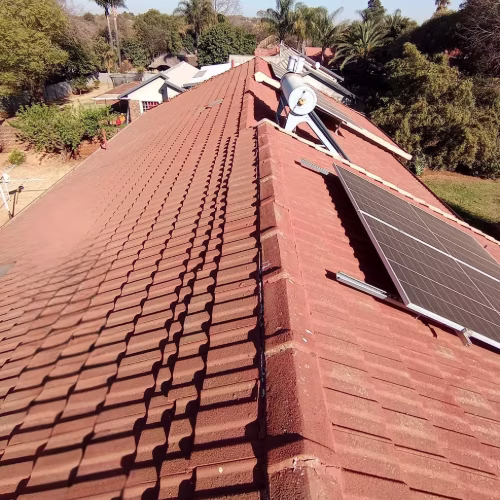 Damp and water damage to a roof before treatment
